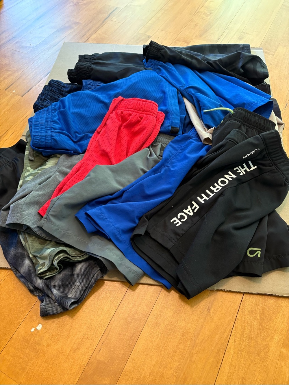 17 pairs of Under Armor, Gap, The North Face Kids Black Active Shorts with Logo